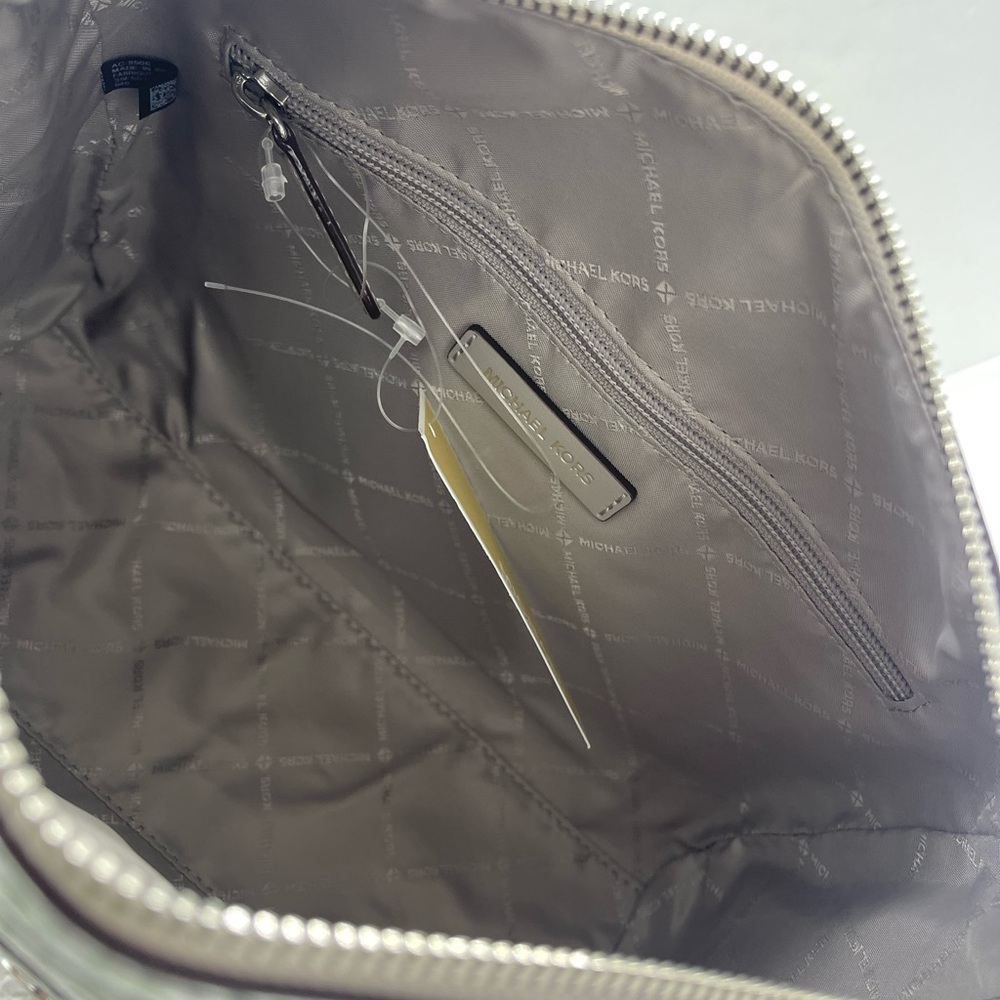 MICHAEL KORS Jet Set Medm Patent Logo Debossed Duffel Crossbody Bag
Silver 
NWT - Picture 13 of 15